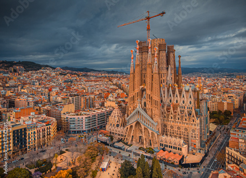 The Cathedral of La Sagrada Familia by the architect Antonio Gaudi, Catalonia, Barcelona Spain - April  2021. Aerial view