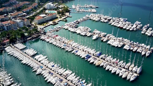 Drone view on beautiful Fethiye city and Fethiye harbor full of yachts and boats