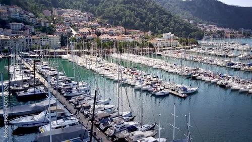 Drone view on beautiful Fethiye city and Fethiye harbor full of yachts and boats