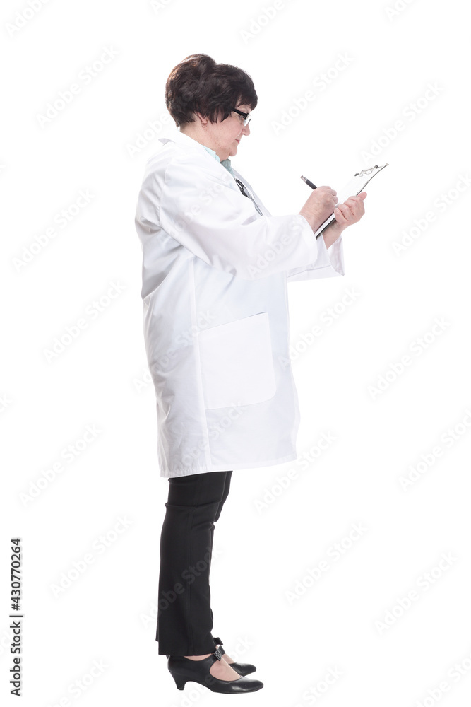 in full growth. senior female doctor with clipboard. in full growth. senior female doctor with clipboard.