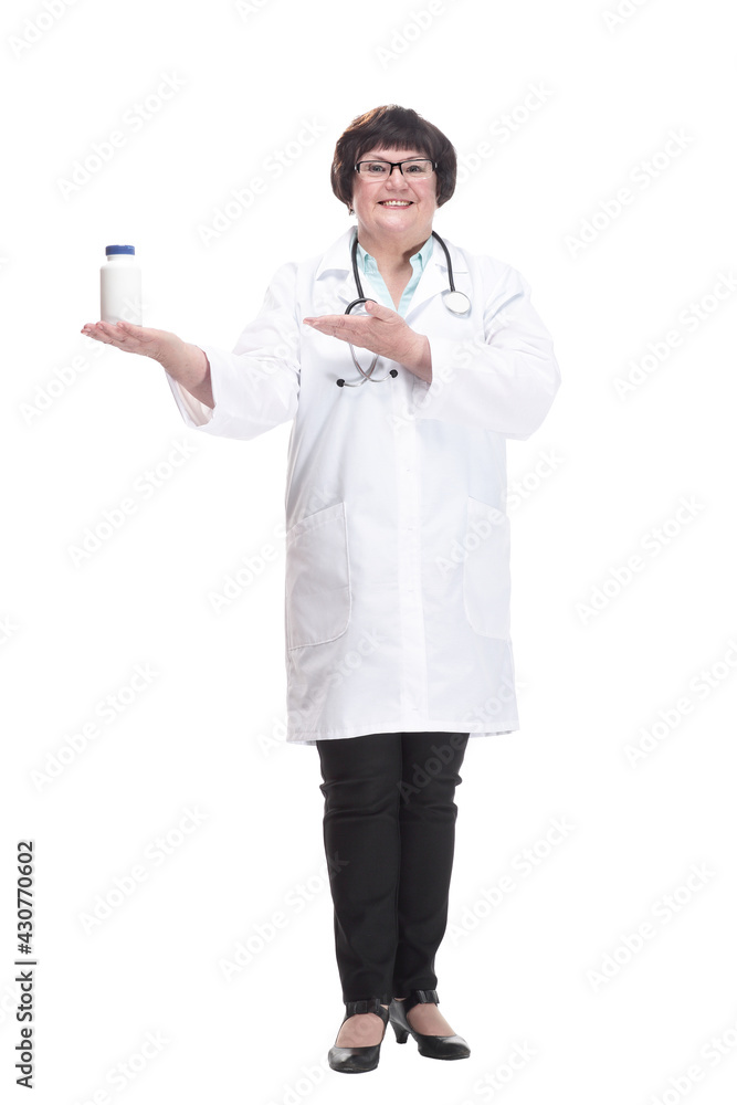 in full growth. senior female doctor with sanitizer in hand . in full growth. senior female doctor with sanitizer in hand .