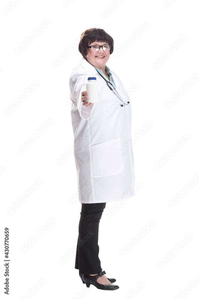 in full growth. senior female doctor with sanitizer in hand . in full growth. senior female doctor with sanitizer in hand .