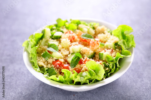 fresh tabbouleh salad with tomato and mint