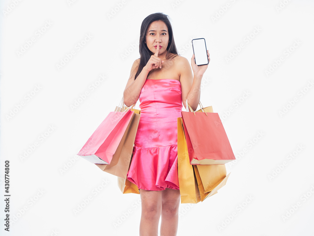 Woman with shopping bags and smartphone Woman with shopping bags and smartphone
