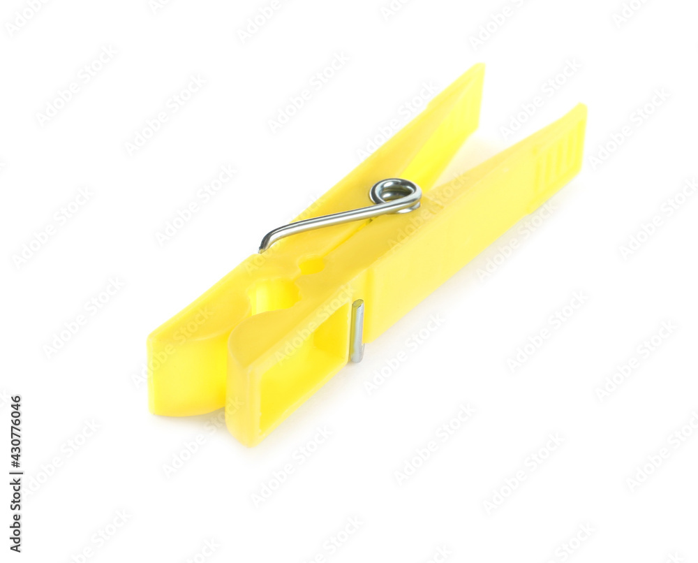 Bright yellow plastic clothespin isolated on white Bright yellow plastic clothespin isolated on white