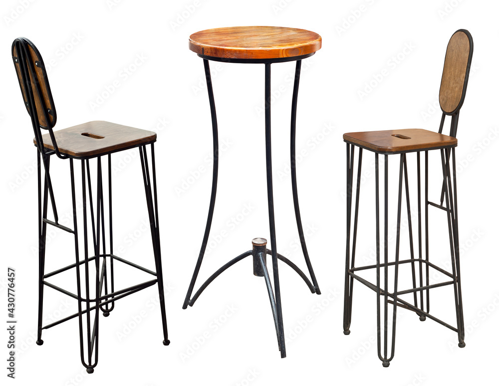 Wrought iron chair and table isolated on a white background. Chairs made of metal and wood close up. Set of garden furniture. Wrought iron chair and table isolated on a white background. Chairs made of metal and wood close up. Set of garden furniture.