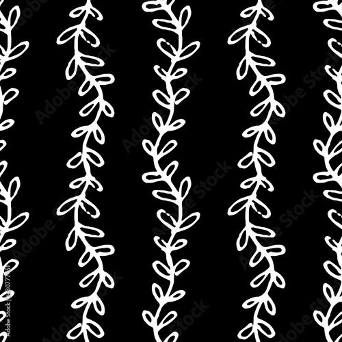 A pattern of vertical wavy lines with rounded leaves. Seamless pattern of vector Twigs with leaves white outline on black background for textile design template, invitations natural motifs