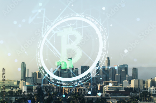 Virtual Bitcoin sketch on Los Angeles cityscape background. Double exposure