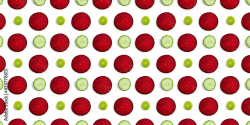 Slices of beet, cucumber and leek - food pattern background 