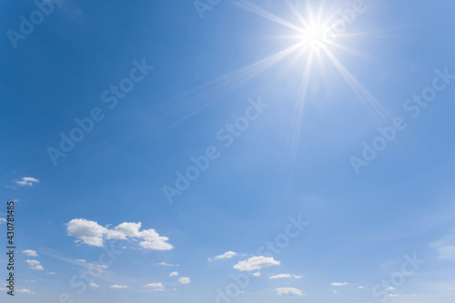 sparkle sun on a cloudy sky  natural summer sky background