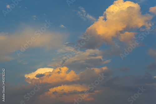 evening sky with dense cumulus clouds, natural sky background