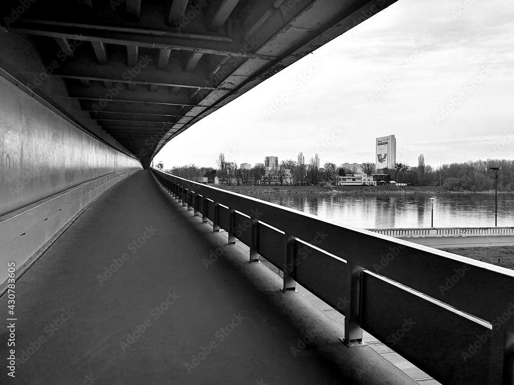 Black and white neverending bridge above the Danube river in Bratislava. Black and white neverending bridge above the Danube river in Bratislava.