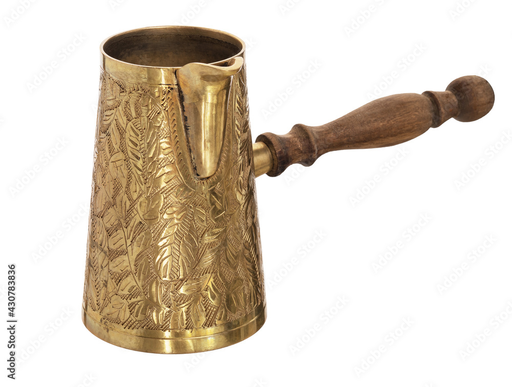 brass turkish coffee maker on white background brass turkish coffee maker on white background