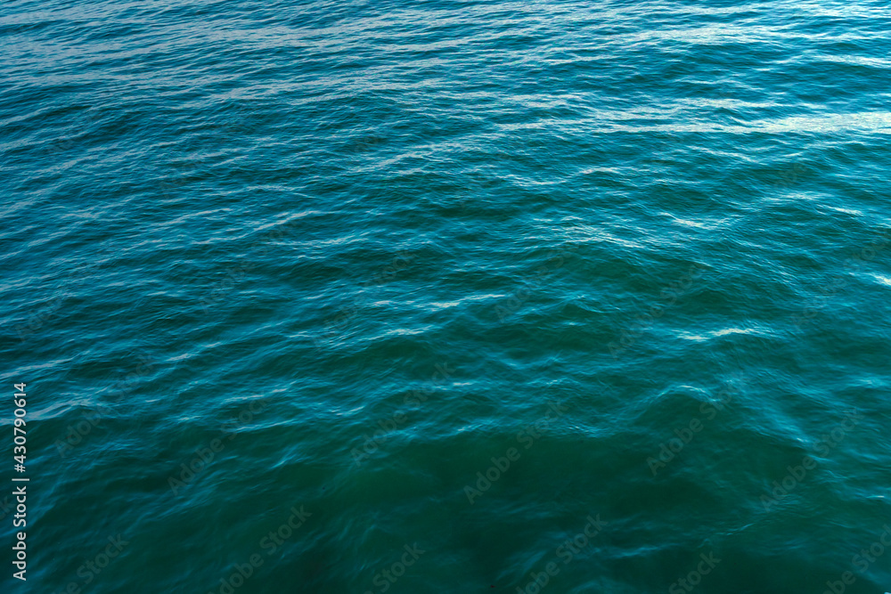 Blue ocean close-up, calm waves, background image