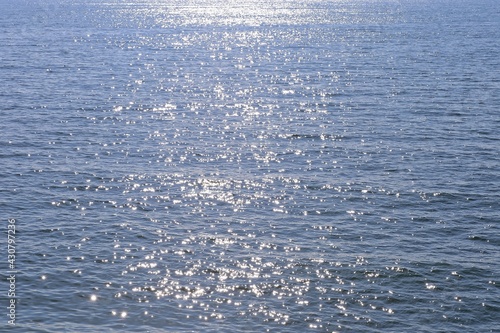 Sun reflections in sea water.