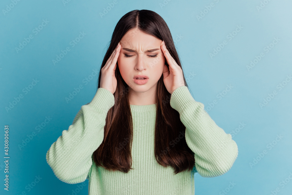 Portrait of troubled unhappy woman touch head suffer headache pain isolated on white background Portrait of troubled unhappy woman touch head suffer headache pain isolated on white background