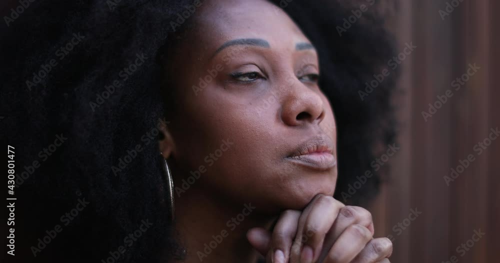 Worried black African woman close-up face Worried black African woman close-up face
