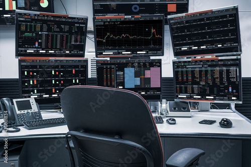 group of stock data monitor analyzing data stock market in monitoring room on the data presented in the chart, forex trading graph, stock exchange trading online, financial investment