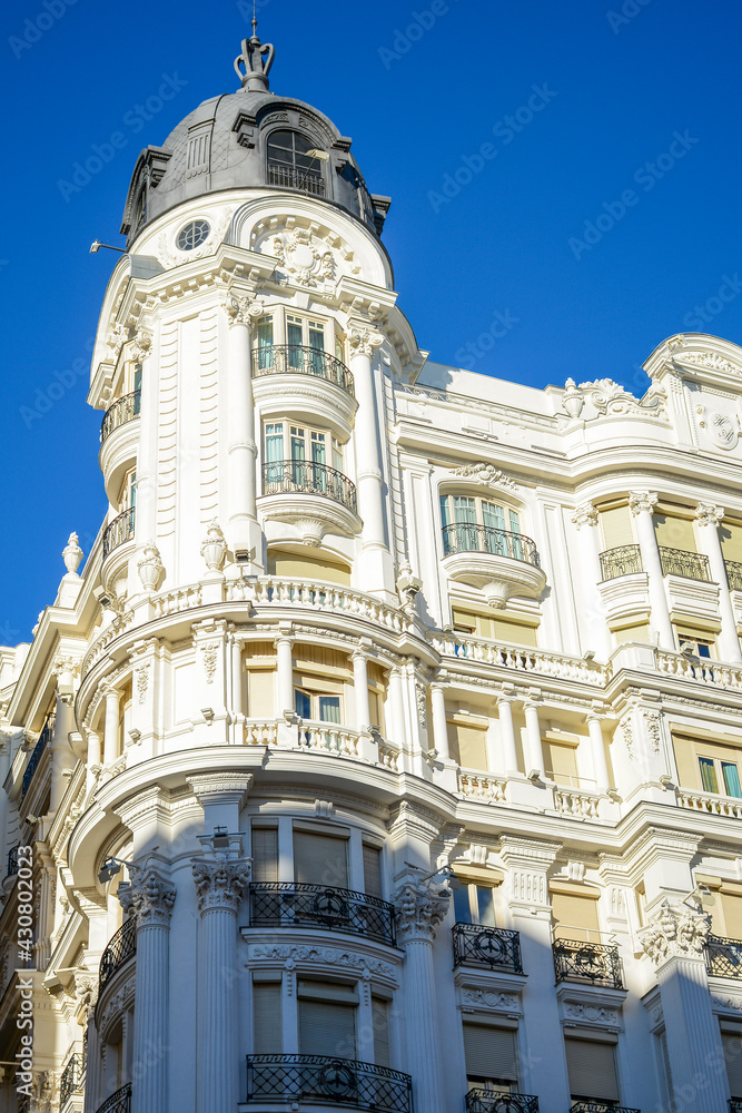 Madrid, Spain - October 25, 2020: Beautiful architecture located Gran Via street one of the city biggest streets