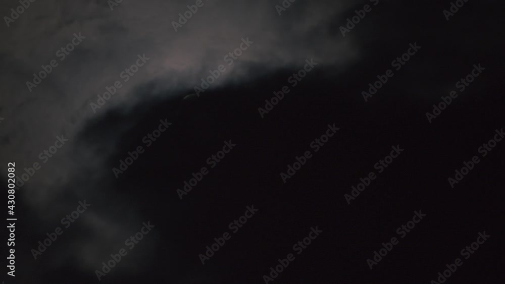 The Moon in a dark cloudy night The Moon in a dark cloudy night