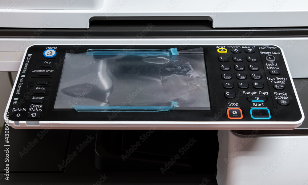 Close-up of the touch screen and the number pad on the control panel. Close-up of the touch screen and the number pad on the control panel.