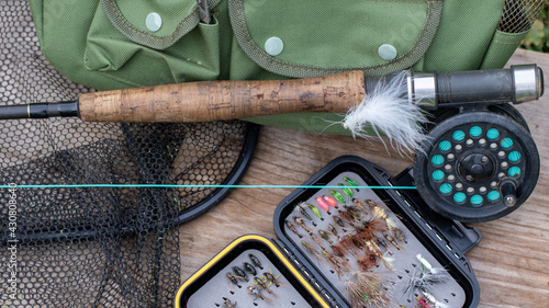 Obraz na plátne fly rod and reel, net, fly box, nymphs and creel ready to fish