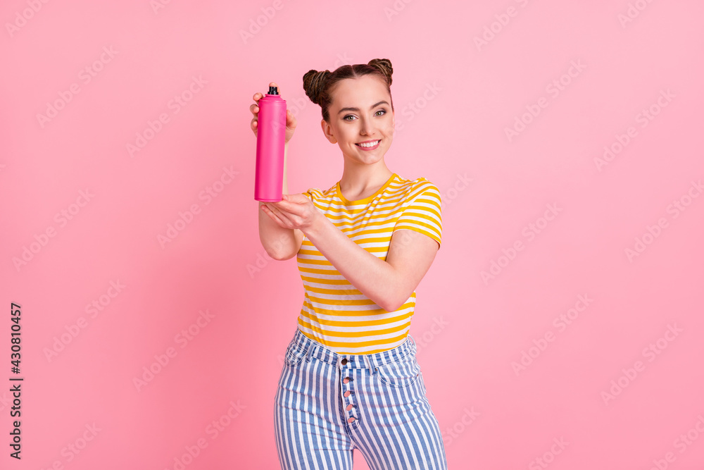 Portrait of adorable person beaming smile arms demonstrating hairdresser isolated on pink color background Portrait of adorable person beaming smile arms demonstrating hairdresser isolated on pink color background