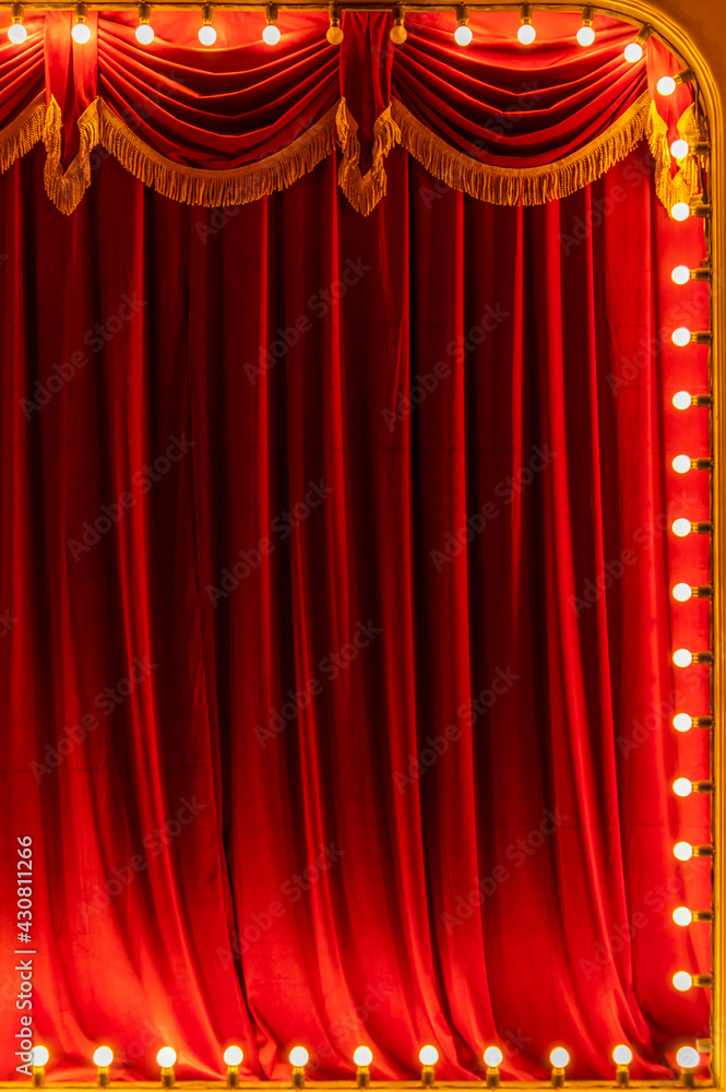 Theater red curtain and neon lamp around border