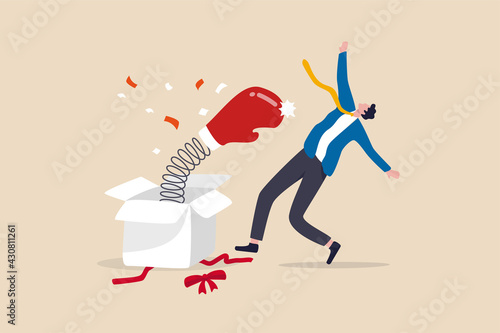 Being fired from job, unemployment and jobless, business failure or stock market bad news surprise investor concept, businessman open present box with surprise boxing glove punching knock out.