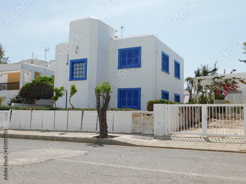 Greek style house in blue and white on Cyprus island. photo