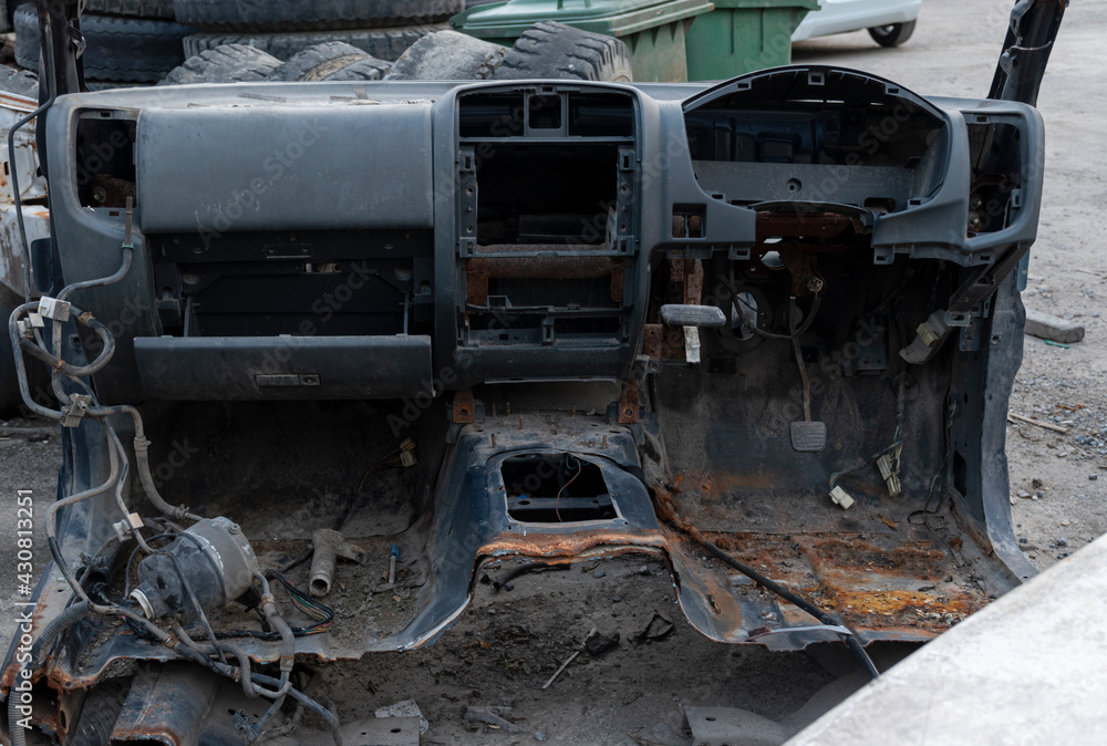 Old wrecked cars in junkyard