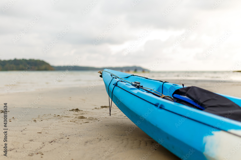 Kayak standby for tourist on the beach, one of favorite activity when come to the sea Kayak standby for tourist on the beach, one of favorite activity when come to the sea
