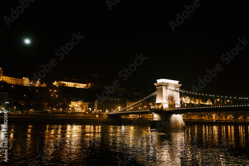 Night view of the Szechenyi chain bridge in Budapest with illumination