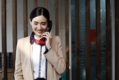 Asia reception woman smile portrait in reception area at hotel.