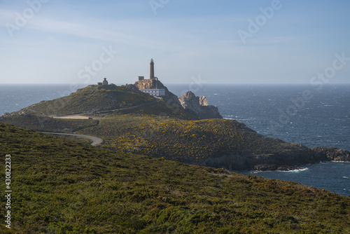 Beautiful shot of a rock-bound peninsula near the sea in Cape Vilan, Galicia, Spain photo