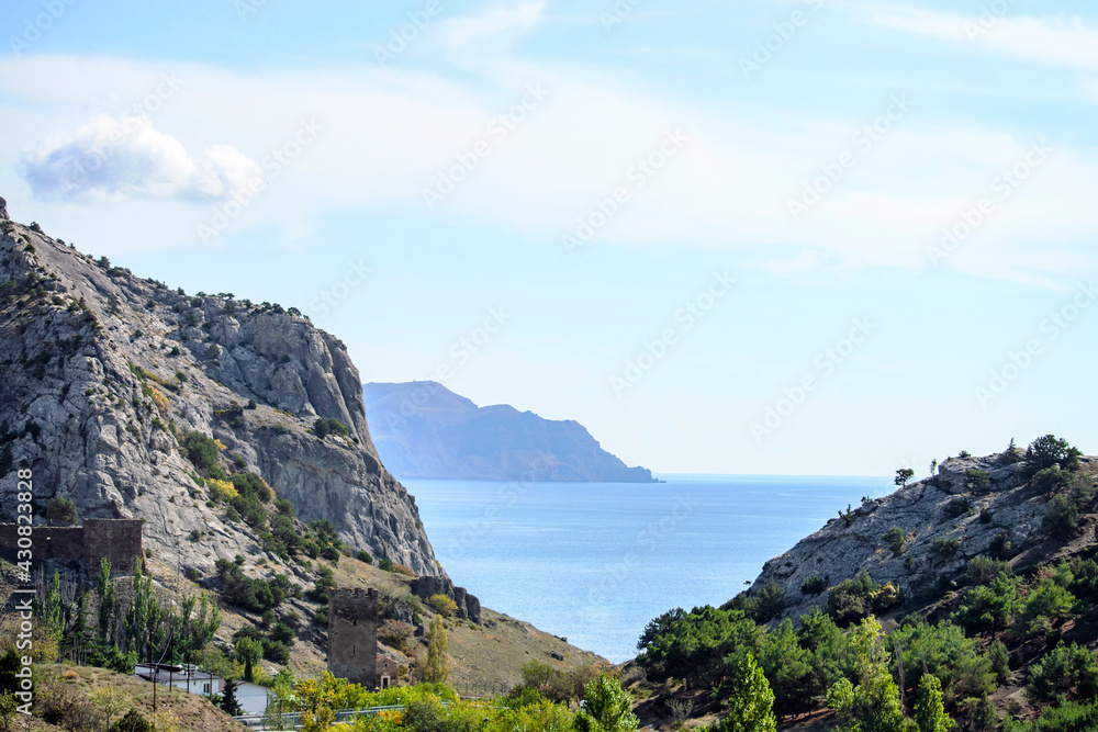 Fototapeta premium Crimean rocks and sky. Sunny autumn day. Front view