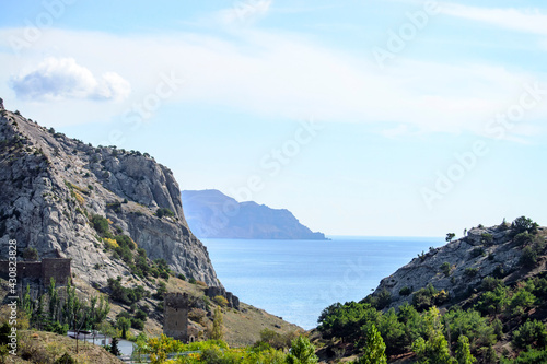 Crimean rocks and sky. Sunny autumn day. Front view