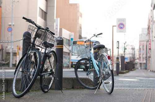 Bicycle secured on a parking in a city in Japan
