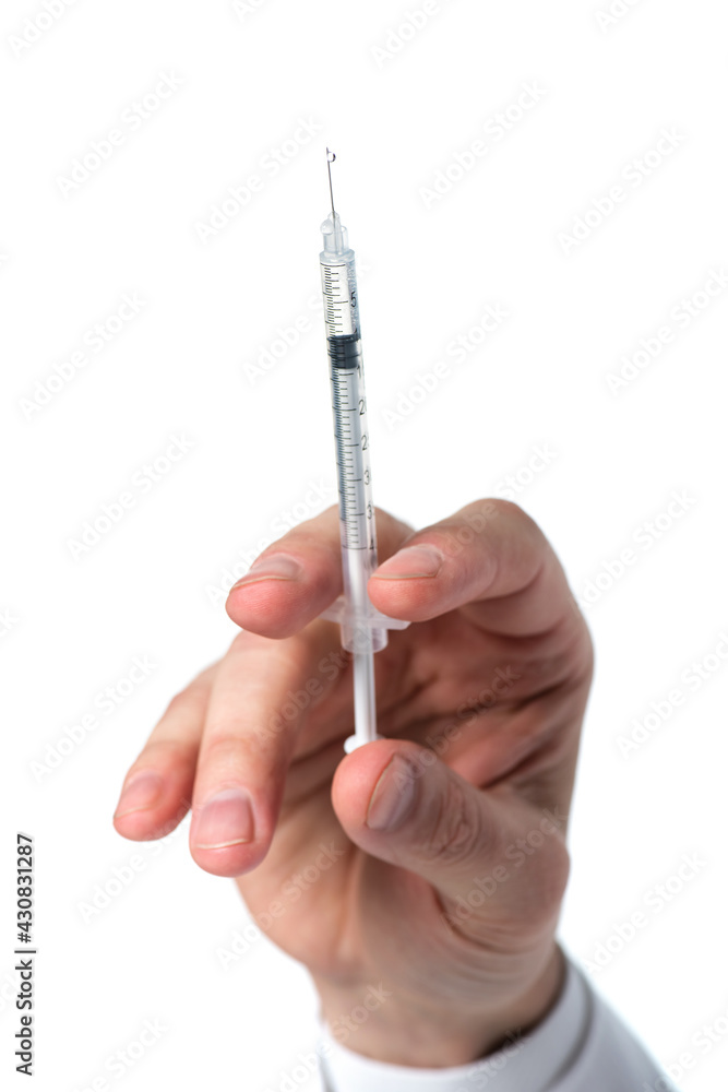 Cropped view of syringe in hand of doctor isolated on white Cropped view of syringe in hand of doctor isolated on white