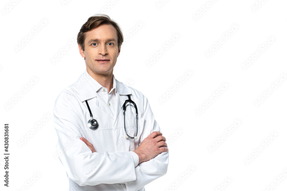 Doctor with crossed arms looking at camera isolated on white