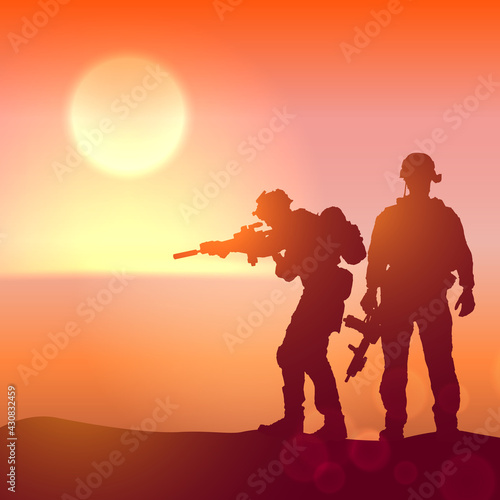 Silhouette of a soldiers against the sunrise. Concept - protection, patriotism, honor.