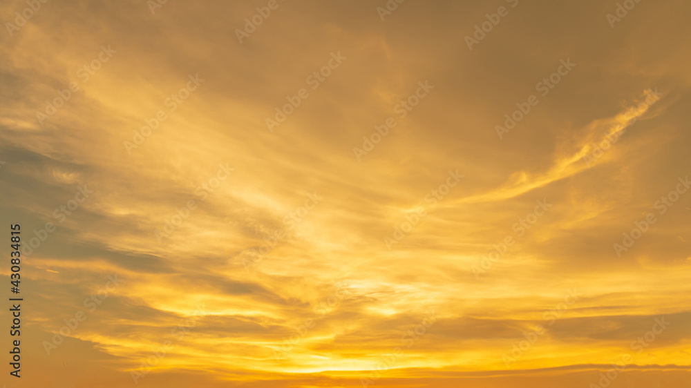 Dramatic clouds and sky like heaven view at sunset time. with gold or golden light tone.