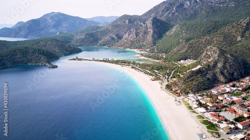 Amazing beautiful panoramic view from drone of natural park of Oludeniz and Fethiye blue lagoon and tranquil aquamarine dead sea.
