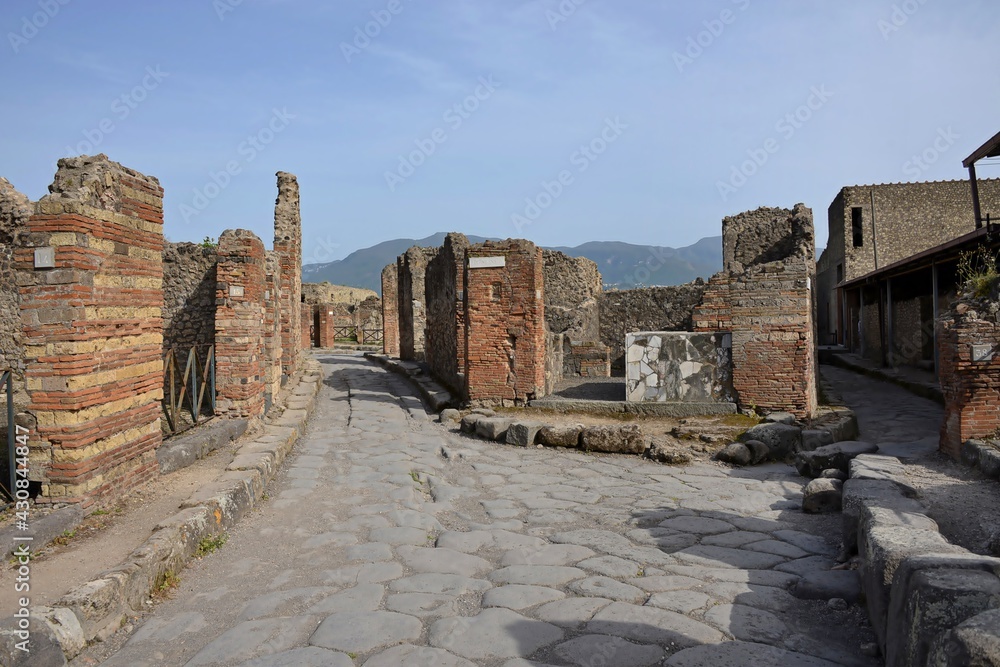 Ancient Pompeii is a vast archaeological site, once a thriving and sophisticated Roman city, it was buried under meters of ash and pumice from the catastrophic eruption of Mount Vesuvius in 79 AD