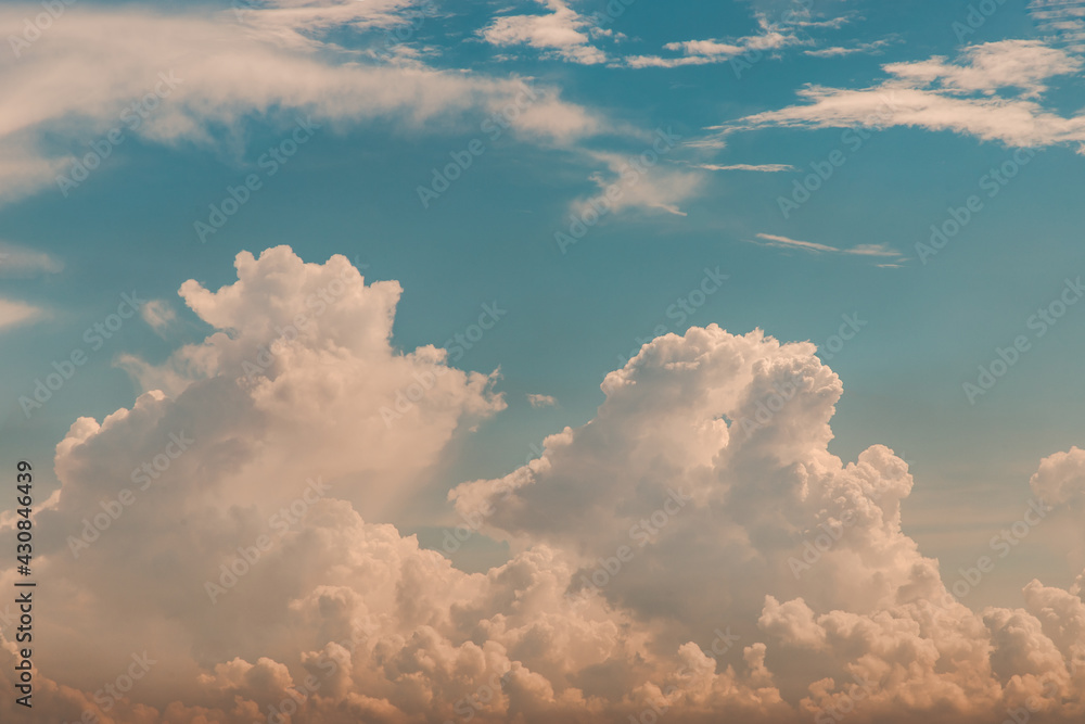 The sun shines through the clouds in the sky. The shape of the clouds evokes imagination and creativity. They can be used as wallpapers that look amazing. Copy space, No focus, specifically. The sun shines through the clouds in the sky. The shape of the clouds evokes imagination and creativity. They can be used as wallpapers that look amazing. Copy space, No focus, specifically.