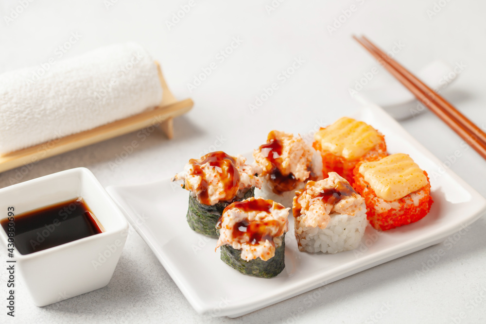 Japanese food sushi roll set with soy sauce on the table Japanese food sushi roll set with soy sauce on the table