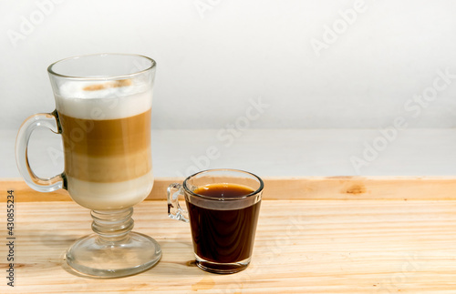 Glass of macchiato latte and espresso.