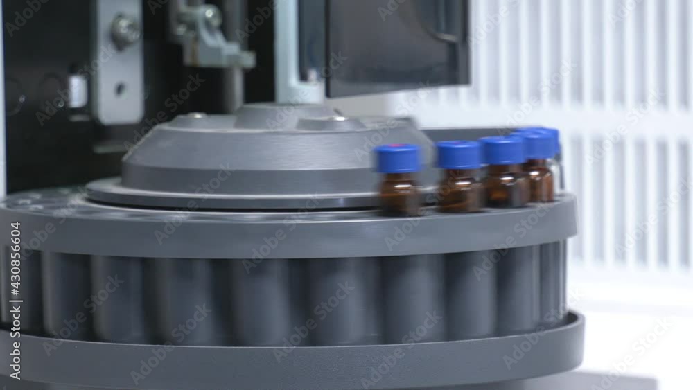 Biochemical analyzer in science laboratory. Many vials are arranged in the auto sampler for the lab equipment in chemical laboratory.
Biochemical analyzer in science laboratory. Many vials are arranged in the auto sampler for the lab equipment in chemical laboratory.