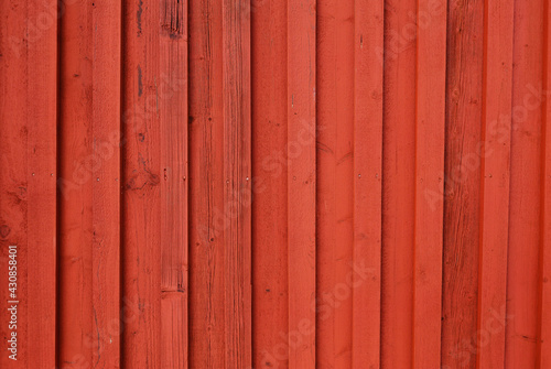 Red painted wooden wall photo