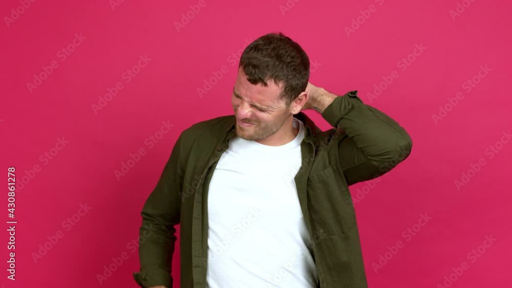 Brazilian handsome man with neck pain over isolated background Brazilian handsome man with neck pain over isolated background